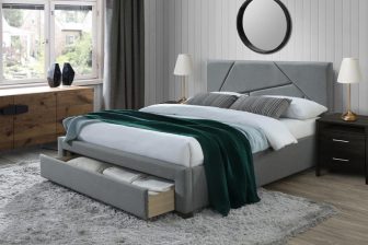 Szare łózko tapicerowane z szufladą