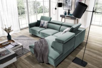 Miętowy narożnik z funkcja spania z oparciem z obu stron