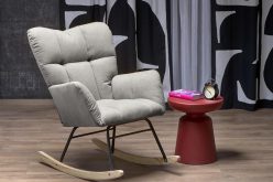 Szary fotel na biegunach bardzo miękki