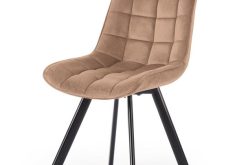 Beżowe nowoczesne krzesło na czarnych metalowych nogach