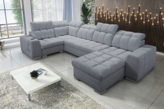 Duży narożnik U z wysokimi oparciami z regulacja z funkcją spania