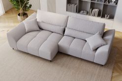 Nowoczesny narożnik z przeszyciami i dużymi poduchami