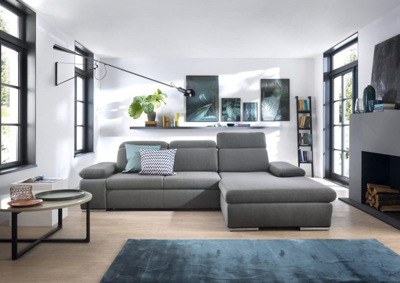 Szary narożnik do salonu z funkcją spania w stylu industrialnym