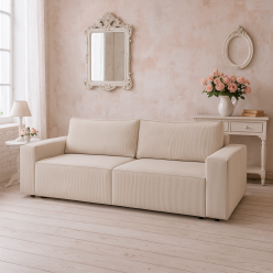 Beżowa sofa z dużą powierzchnią spania i z dwoma pojemnikami na pościel