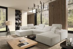 Ogromny beżowy narożnik U do salonu z funkcją spania