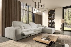 Beżowy narożnik z rozkładanym podnóżkiem rozkładany do spania