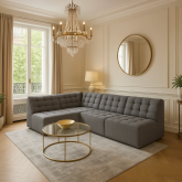Szara kanapa rogowa w salonie glamour