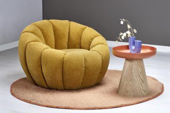 Musztardowy fotel okrągły designerski