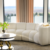 Zaokrąglona symetryczna kanapa do salonu