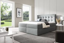 Łózko kontynentalne z wysokim zagłówkiem i materacami kieszeniowymi